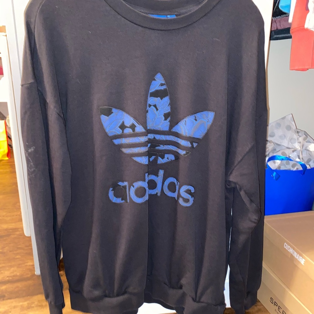 Adidas sweatshirt.